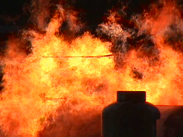 Simulated Class B (propane) fire burning wildly at night